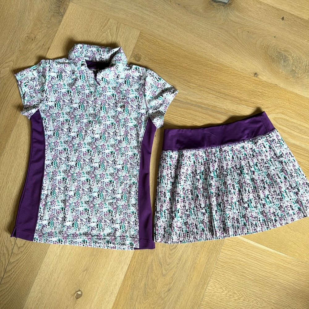 LIKE NEW BARELY WORN girls Golf/ Tennis set, Size LG, Pleated Built in shorts.